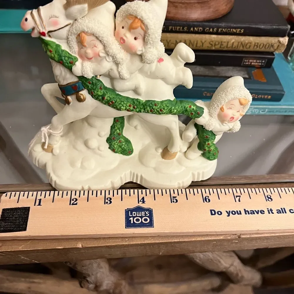 Christmas Vintage Tykes on Ice Magical Ride Porcelain Figurine.
